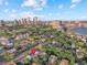 Stunning aerial view showcasing the home's prime location near the city skyline and waterfront at 701 S Boulevard, Tampa, FL 33606