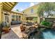 Private backyard features custom water feature and stone spa with mature plants at 701 S Boulevard, Tampa, FL 33606