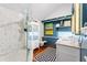 Bathroom featuring marble walk-in shower, stylish vanities and modern fixtures at 701 S Boulevard, Tampa, FL 33606