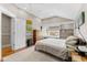 Bedroom featuring a queen sized bed, natural light, and closet at 701 S Boulevard, Tampa, FL 33606