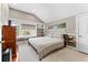 Bedroom with bed, closet, and natural light from large window at 701 S Boulevard, Tampa, FL 33606