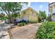 Two-car garage with parking space in front, adjacent to the home and street at 701 S Boulevard, Tampa, FL 33606