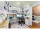 Comfortable office featuring custom built-in shelving and great natural light at 701 S Boulevard, Tampa, FL 33606