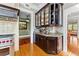 Kitchen featuring custom glass cabinetry and stainless steel appliances including a professional grade range at 701 S Boulevard, Tampa, FL 33606