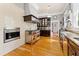 Kitchen features hardwood floors, stainless steel appliances, granite countertops and custom cabinetry at 701 S Boulevard, Tampa, FL 33606