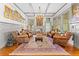 Elegant living room featuring coffered ceilings and ample natural light at 701 S Boulevard, Tampa, FL 33606