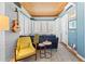 Inviting living room with stylish seating, wood ceiling, and bright, airy ambiance at 701 S Boulevard, Tampa, FL 33606