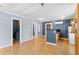 Open-concept living room with adjacent kitchen and laundry area at 701 S Boulevard, Tampa, FL 33606