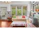 Comfortable living room with hardwood floors, fireplace, and ample natural light at 701 S Boulevard, Tampa, FL 33606