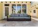 Comfortable patio seating with modern outdoor sofa and decorative throw pillows at 701 S Boulevard, Tampa, FL 33606