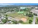 Aerial view of the neighborhood's local Azalea Park, disc golf, and tennis courts at 7202 8Th N Ave, St Petersburg, FL 33710