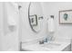 Updated bathroom featuring modern fixtures, ample lighting, and decorative art at 7202 8Th N Ave, St Petersburg, FL 33710