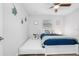 This bedroom features both a standard bed and a trundle bed at 7202 8Th N Ave, St Petersburg, FL 33710