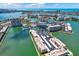 Aerial view of waterfront community with a marina and gorgeous water views at 7645 Sun Island S Dr # 204, South Pasadena, FL 33707