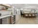 Well-appointed kitchen featuring stainless steel appliances, a spacious island with seating, and convenient bar access at 9807 Bay Island Dr, Tampa, FL 33615