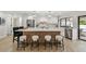 Bright, open kitchen featuring quartz countertops, island seating and stainless appliances at 9807 Bay Island Dr, Tampa, FL 33615