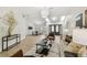 Bright open-concept living room flowing into the dining area with neutral tones and modern decor at 9807 Bay Island Dr, Tampa, FL 33615