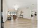 Bright living room featuring wood floors and views of the water at 9807 Bay Island Dr, Tampa, FL 33615