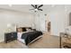 Relaxing main bedroom featuring a ceiling fan, a neutral color palette, and an en-suite closet at 9807 Bay Island Dr, Tampa, FL 33615