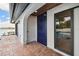 Inviting outdoor space features an outdoor shower and entry door near the waterfront pool area at 9807 Bay Island Dr, Tampa, FL 33615