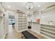 Expansive walk-in closet with custom shelves and built-ins, offering ample storage space at 9807 Bay Island Dr, Tampa, FL 33615