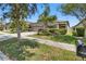 Charming single-story home featuring a well-maintained lawn and inviting curb appeal at 11638 Palmetto Pine St, Riverview, FL 33569