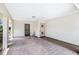 Covered carport featuring a secure screen door, main entrance, and brick-paved flooring at 1218 Haddington Cir, Sun City Center, FL 33573