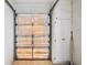View of garage doors and closet for extra storage space at 1218 Haddington Cir, Sun City Center, FL 33573