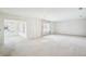 Spacious living room with lots of natural light and neutral carpeting at 1218 Haddington Cir, Sun City Center, FL 33573