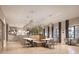 Open common area with modern lighting, decorative plants, and comfortable seating arrangements at 12751 Crystal Jade Way, Parrish, FL 34219