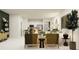 Spacious open-concept living room with modern furnishings and view into the kitchen at 12751 Crystal Jade Way, Parrish, FL 34219