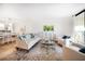Cozy living room with comfortable seating, stylish decor, and a seamless open floor plan at 14810 Rue De Bayonne # 2D, Clearwater, FL 33762