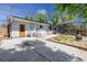Backyard view featuring a pool with screen enclosure and a partial view of the back of the home at 157 7Th Sw Ave, Largo, FL 33770