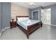 Comfortable bedroom featuring a queen-size bed, a closet, and access to the bathroom at 157 7Th Sw Ave, Largo, FL 33770