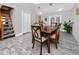 Dining room includes hardwood table and chairs. Stairway located to the left at 157 7Th Sw Ave, Largo, FL 33770