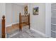 Hallway featuring wooden railing and decorative front door at 157 7Th Sw Ave, Largo, FL 33770