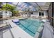 Relaxing enclosed pool with an inflatable float and plenty of space to enjoy the Florida weather at 157 7Th Sw Ave, Largo, FL 33770