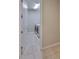 Tiled laundry room featuring a modern, front loading washer and dryer at 1612 Cabbage Key Dr, Ruskin, FL 33570
