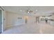 Spacious living room with tile flooring, providing a bright and airy space with an open layout and natural light at 1612 Cabbage Key Dr, Ruskin, FL 33570