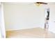 Bright and spacious bedroom with tile flooring, natural light, and a convenient en-suite bathroom at 1741 Fairfield St, Holiday, FL 34691