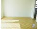 Bright and airy bedroom featuring tile flooring, a large window, and a serene, minimalist design at 1741 Fairfield St, Holiday, FL 34691