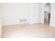 Bright living room with tile flooring and a white closet at 1741 Fairfield St, Holiday, FL 34691