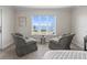 Lovely bedroom seating area features a large window with breathtaking waterfront views at 2087 Edgewater Dr # C, Clearwater, FL 33755