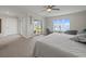 Relax in the bedroom with a gorgeous view and a cozy sitting area at 2087 Edgewater Dr # C, Clearwater, FL 33755