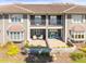 Beautiful condo featuring a balcony, patio and lush landscaping in a tranquil setting at 2087 Edgewater Dr # C, Clearwater, FL 33755