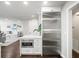 Kitchen area with island and modern appliances, opens to the living room at 2087 Edgewater Dr # C, Clearwater, FL 33755