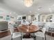Open floor plan with dining area, living room, and updated kitchen at 2087 Edgewater Dr # C, Clearwater, FL 33755