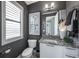 Bathroom with granite vanity, and modern décor at 2511 N Grady Ave # 82, Tampa, FL 33607