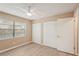 Comfortable bedroom with closet space, a bright window, and modern flooring for relaxation at 2529 Lancaster Dr, Sun City Center, FL 33573