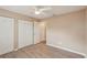 Bright bedroom featuring spacious closets and modern flooring creating a peaceful retreat at 2529 Lancaster Dr, Sun City Center, FL 33573